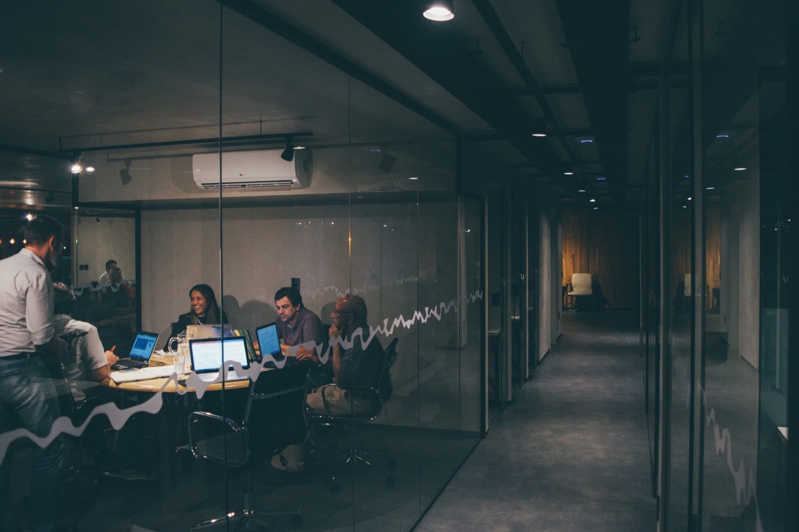 A working session in a glass meeting room