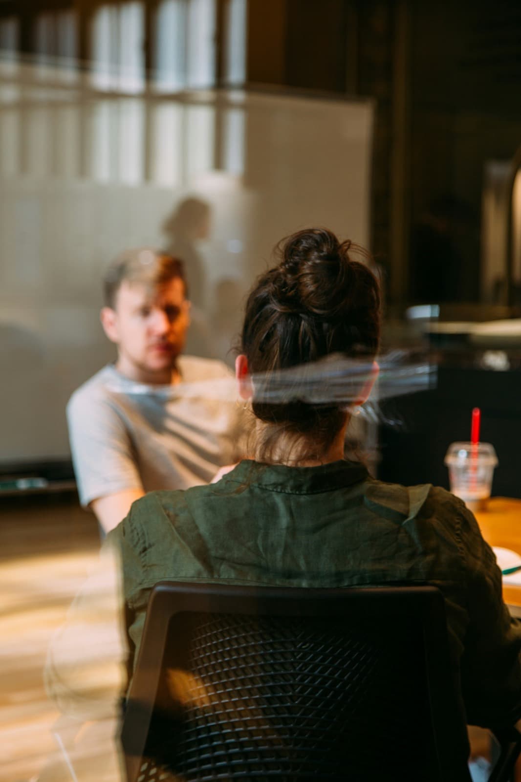 A one-to-one conversation in a small studio